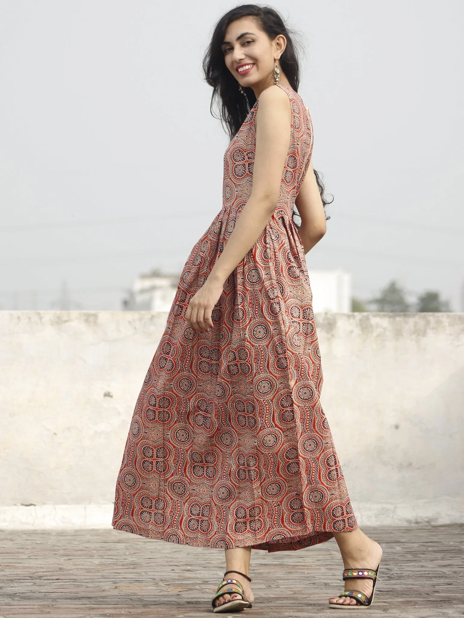 Red Maroon Black Ivory Long Sleeveless Ajrakh Hand Block Printed Cotton Dress With Knife Pleats & Side Pockets - D32F682