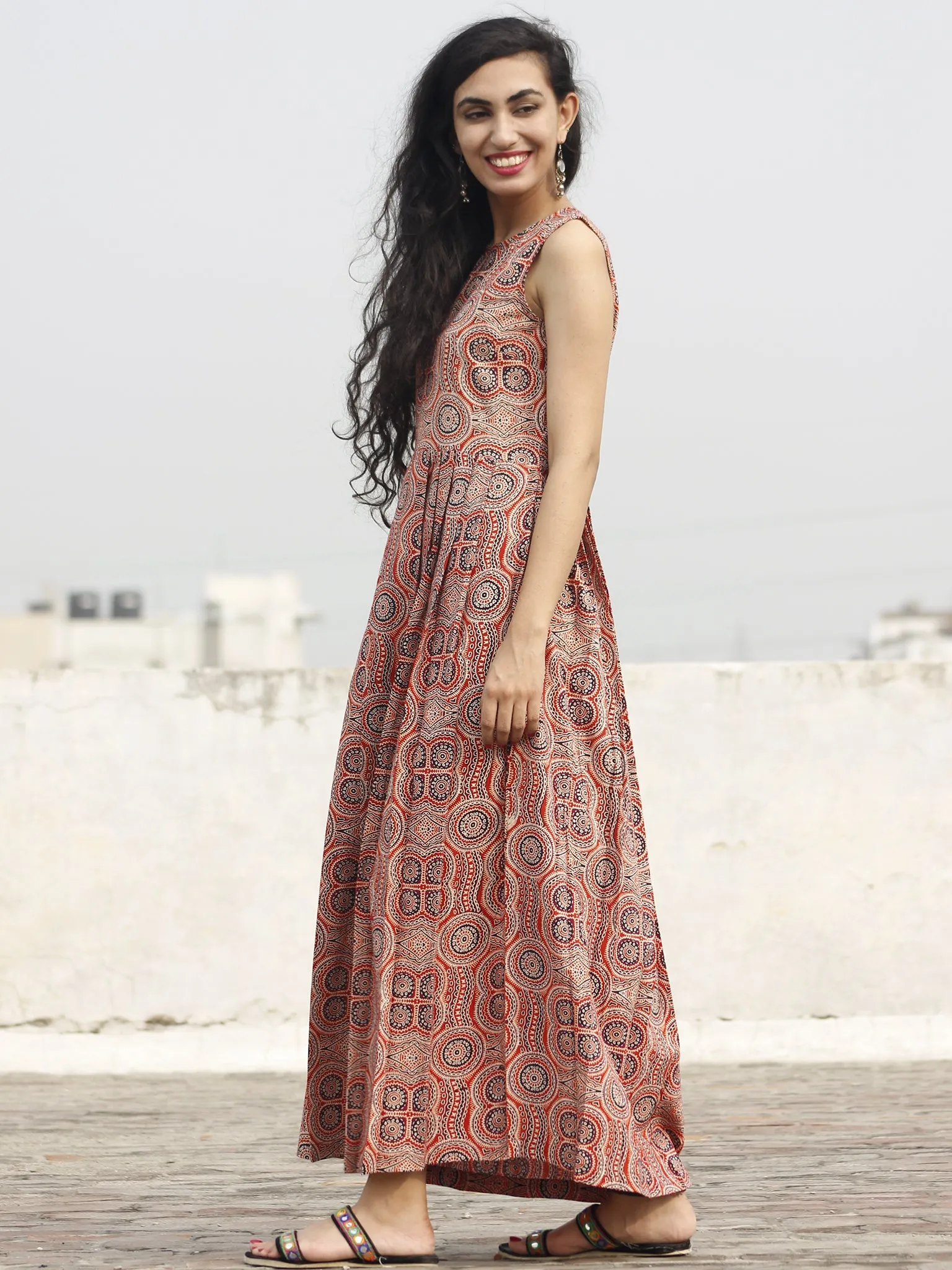 Red Maroon Black Ivory Long Sleeveless Ajrakh Hand Block Printed Cotton Dress With Knife Pleats & Side Pockets - D32F682